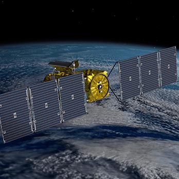 Satellite in space flying over Earth